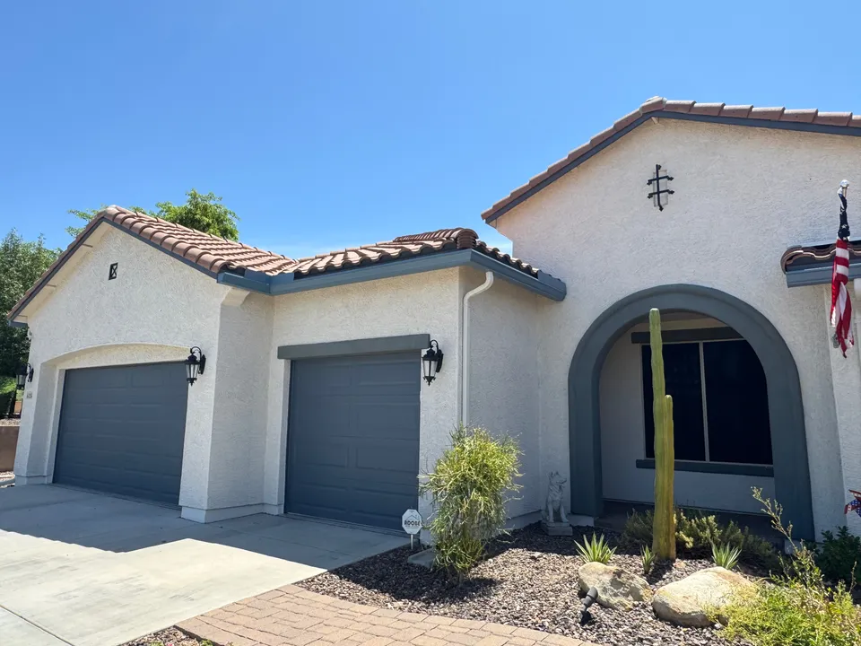 New seamless gutters on a Spanish-style tile-roof home in Phoenix