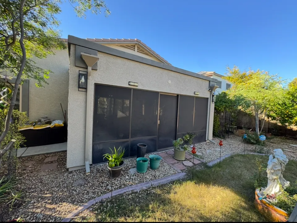 Seamless gutters along a backyard patio roof in Phoenix